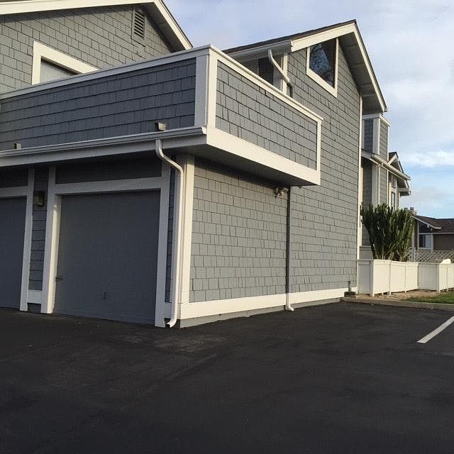 1 car garage with spaces next to it