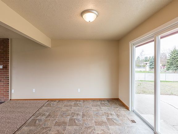 4th image of 11705 E 32nd Ave