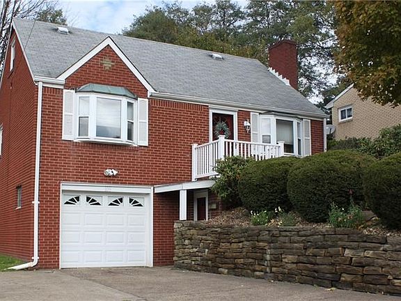 View showing a lower door for entering the home from the driveway for ease of carrying groceries into the house