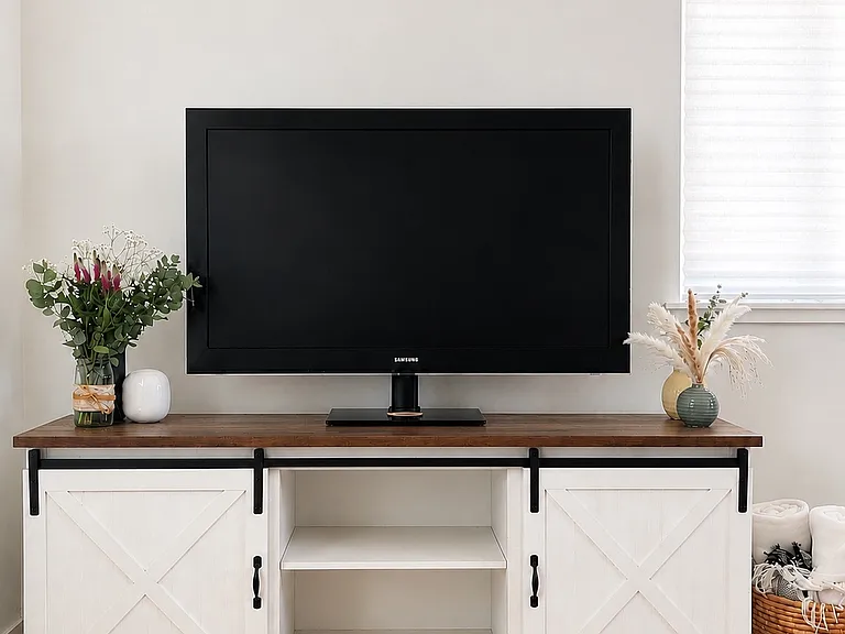 Living Room: Bright, inviting living room with big TV