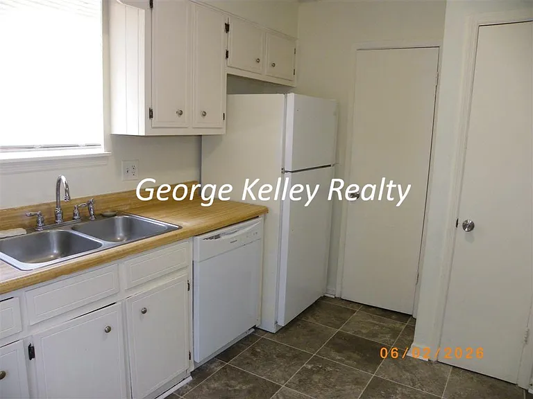 Kitchen 2nd view with like new dishwasher and pantry