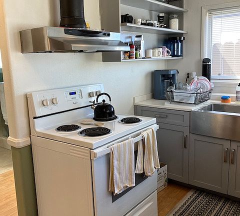 small kitchen with electric stove