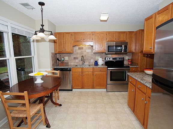 New Appliances, granite and  tile backsplash