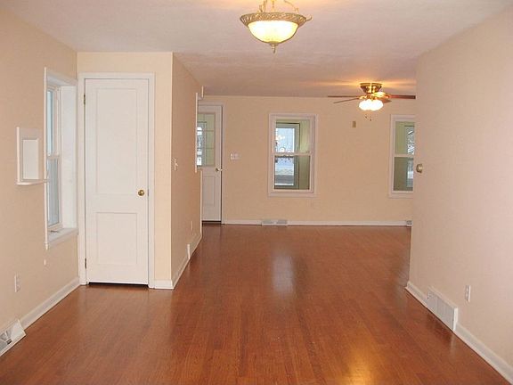 Dining room/living room w/ refinished hardwoods