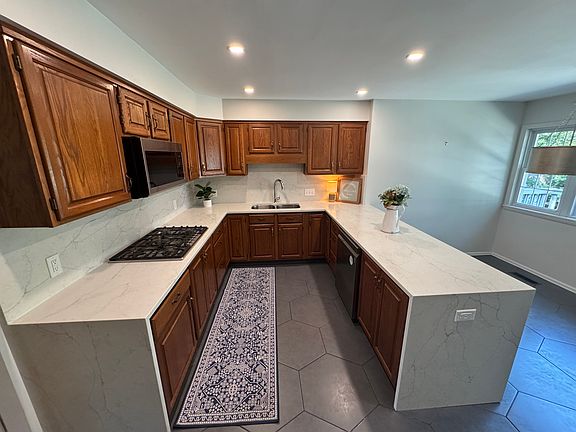 Remodeled kitchen with gas range