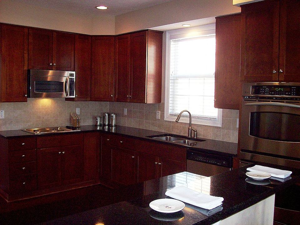 Cherry Kitchen with granite counters
