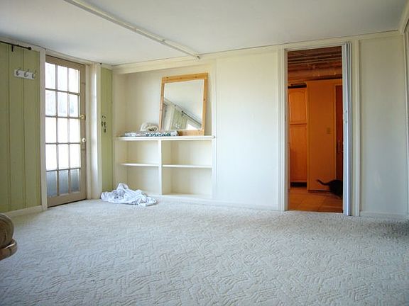 the primary room; the carpet is gone