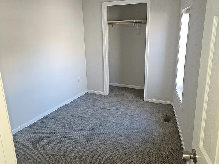 2nd bedroom perfect for a nursery, small guest room, or home office.