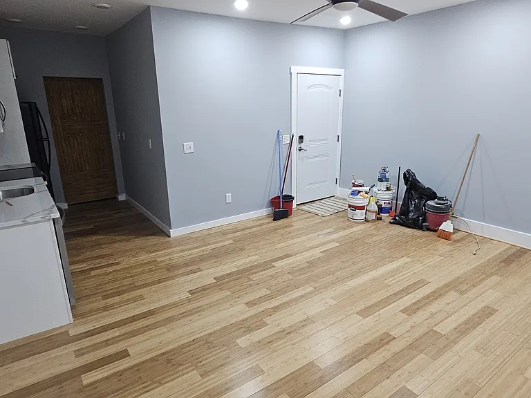 full living room and Kitchen and entry door to unit