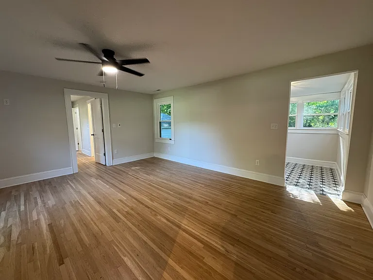 Family room leading to Sunroom to back yard