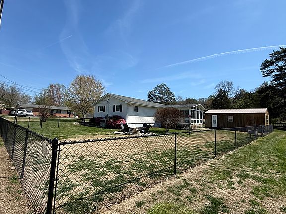 Completely fenced back yard. Installed 2024.