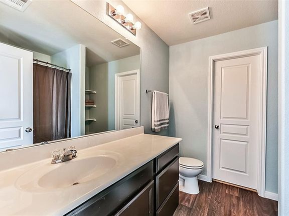 The large family room opens to the eat in kitchen.