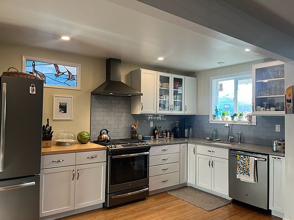 Open kitchen with ample counter and storage space.