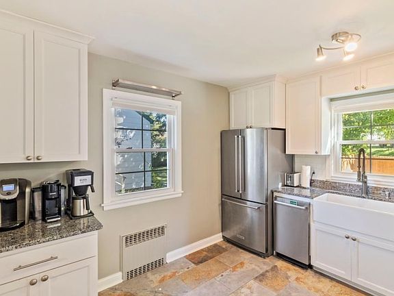 Stainless appliances and tile floor