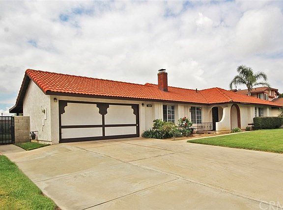 Tile roof and a 2 car attached garage with direct access to the home.