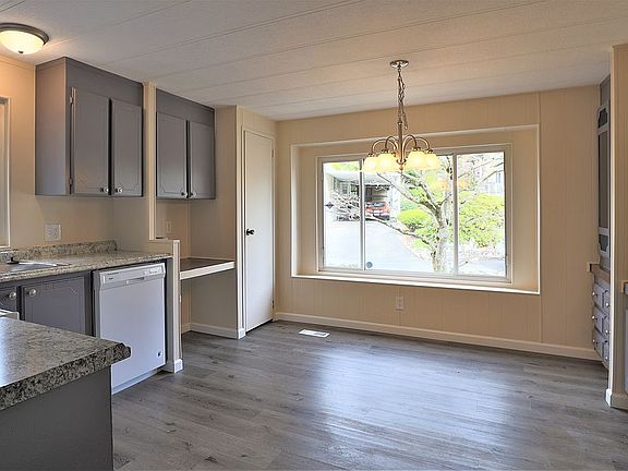 KITCHEN SHOWING OPEN DINING 