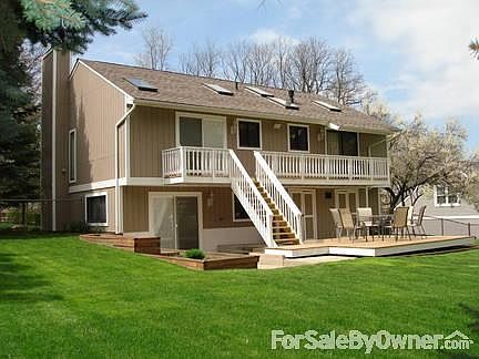 back yard
						:
						private fenced in back yard, multilevel deck, concrete patio, flower boxes,