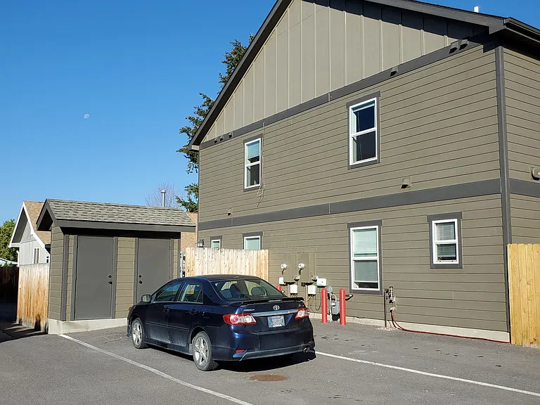 Back storage & parking. Low maintenance lawncare.
