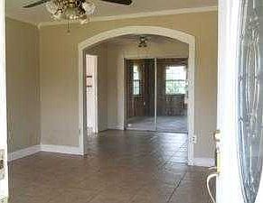 Living Room with Custom Arch to Dining Room