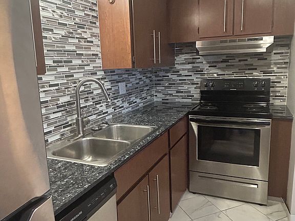 Beautiful tiled backsplash and flooring
