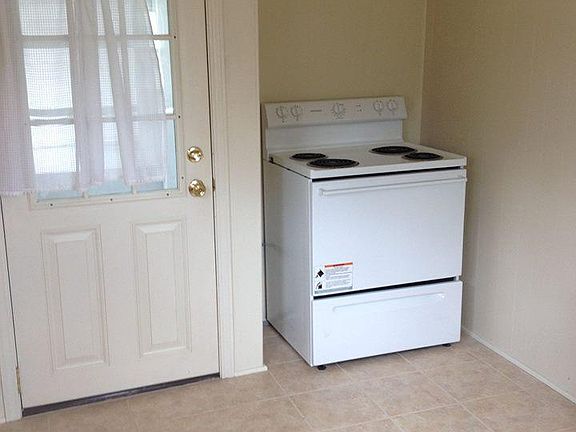 Kitchen - stove and entry door