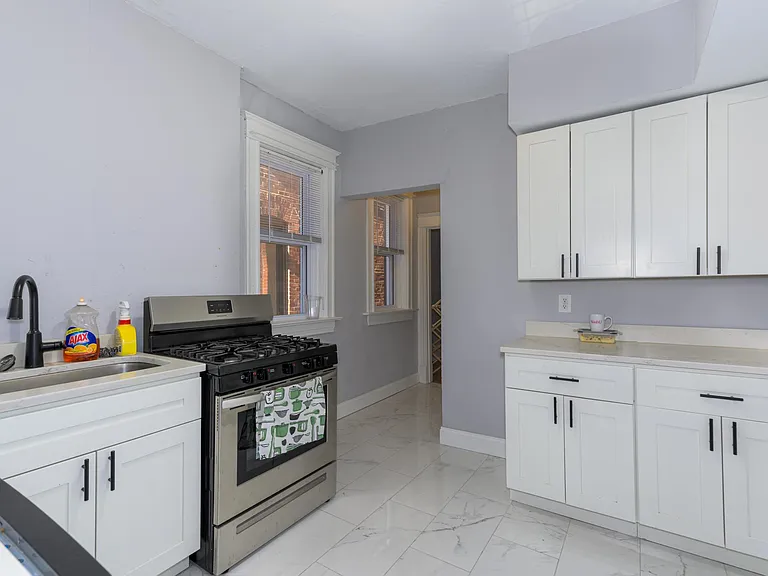 6128 Waterman Blvd — Photo 8