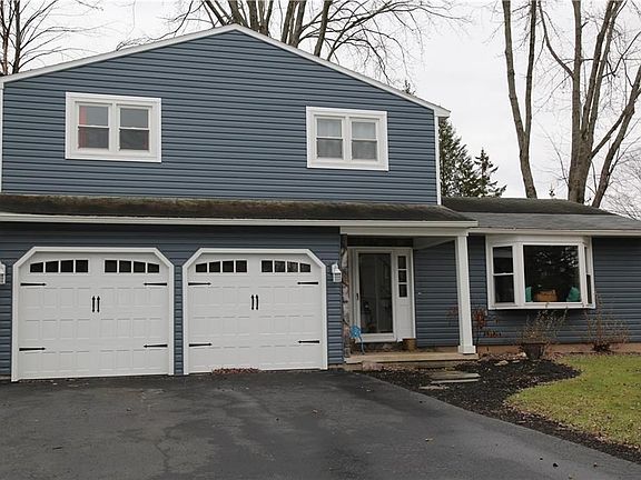 Brand new insulated garage doors with openers.