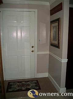 Tile entryway living room