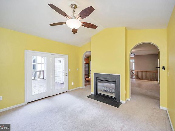 Sunroom with double sided gas fireplace
