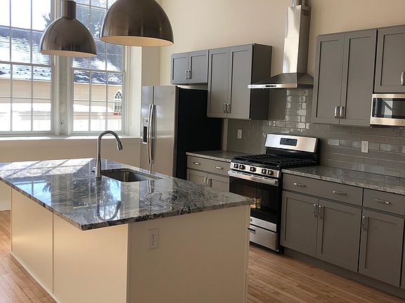 Gourmet kitchen with gas range.