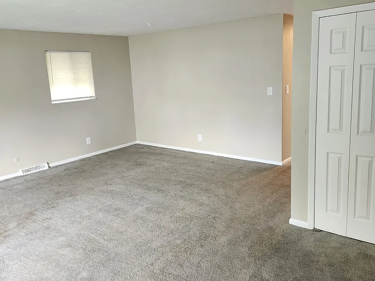 Living Room, New paint throughout, modern accessible beige by Sherwin Williams!