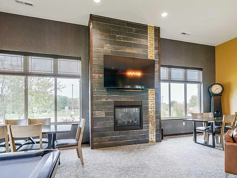Our clubhouse includes a TV lounge and fireplace for residents to enjoy.