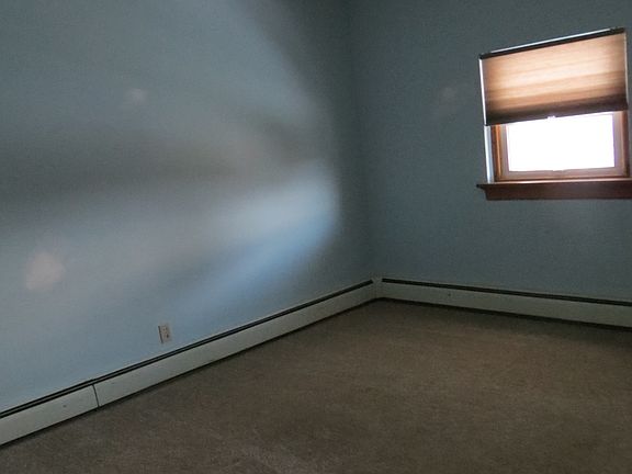Bedroom with Ceiling fan and cedar closet