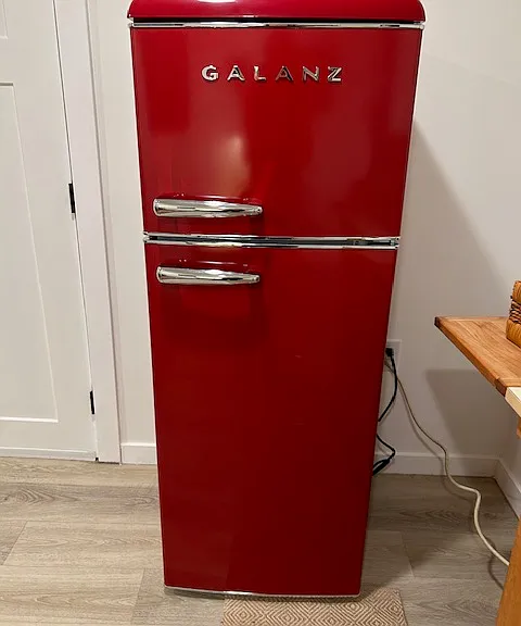 almost full size fridge with freezer