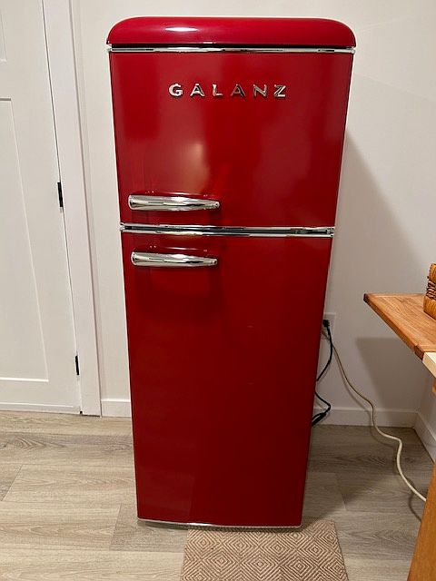 almost full size fridge with freezer