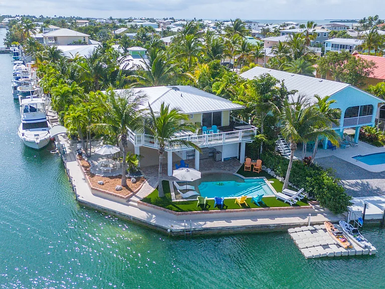 Best of both worlds. Open water to enjoy from the pool and deck. Boat dockage is protected in the canal. There is a floating dock available for kayak launching.