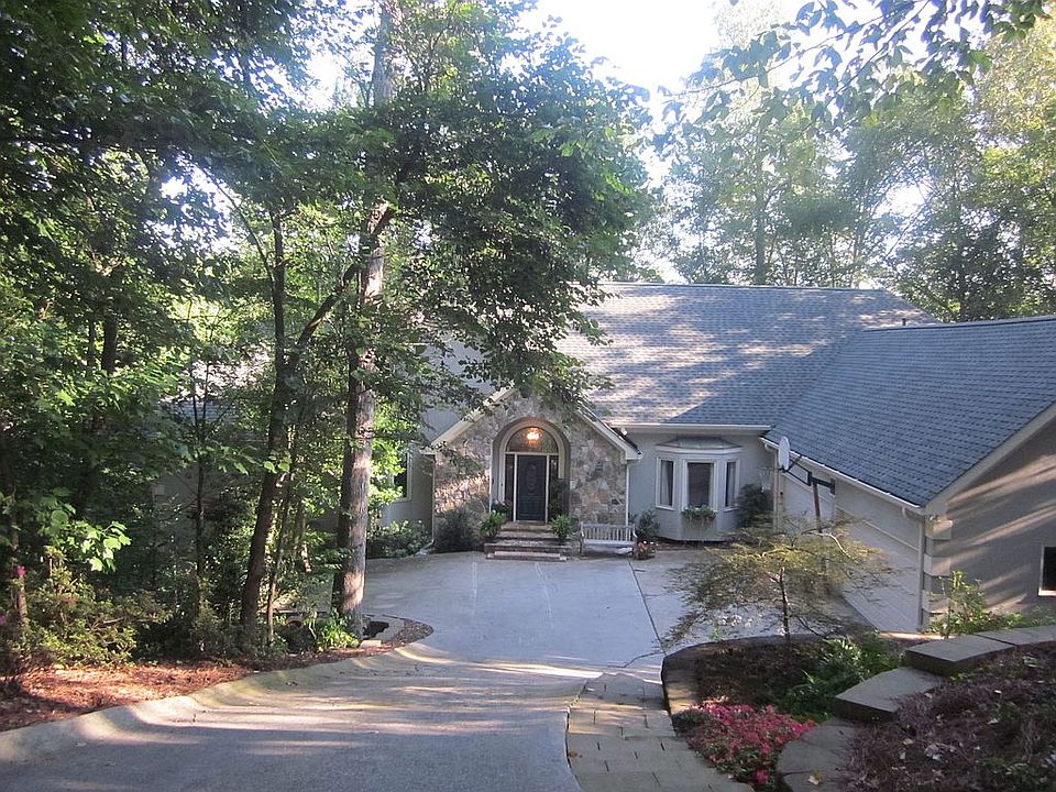 Welcome to this Lovely Hardcoat Stucco Home on the lake!  