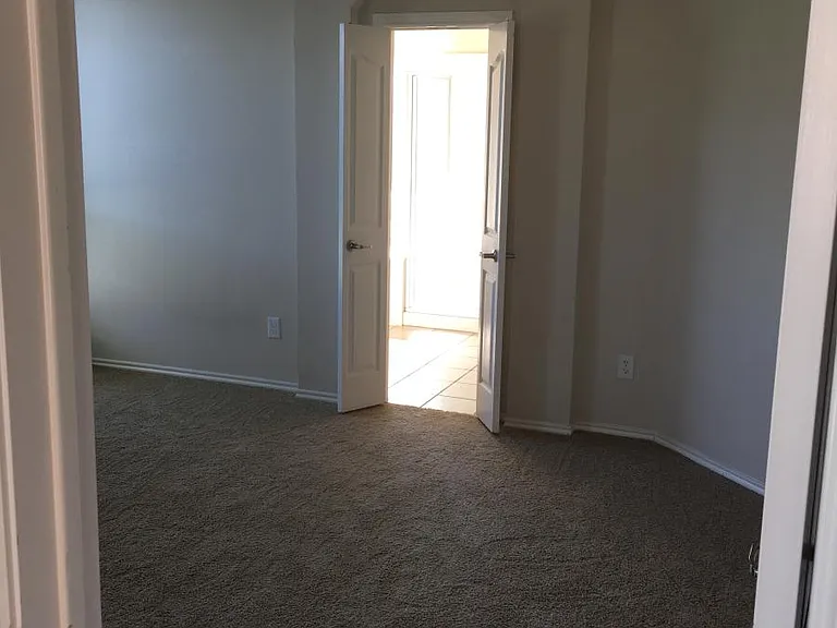 Master Bedroom The floors are laminate now. No carpet