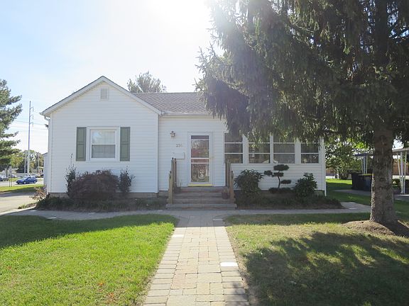Lovely landscaping and paver walkway