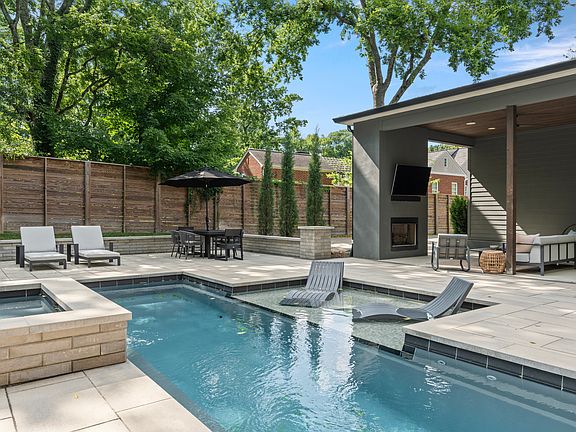 Enjoy a luxurious heated saltwater pool, relaxing hot tub, and rejuvenating sauna. Lounge on the spacious pool deck with comfortable sun chairs or enjoy a glass of wine in front of the smokeless Firepit.