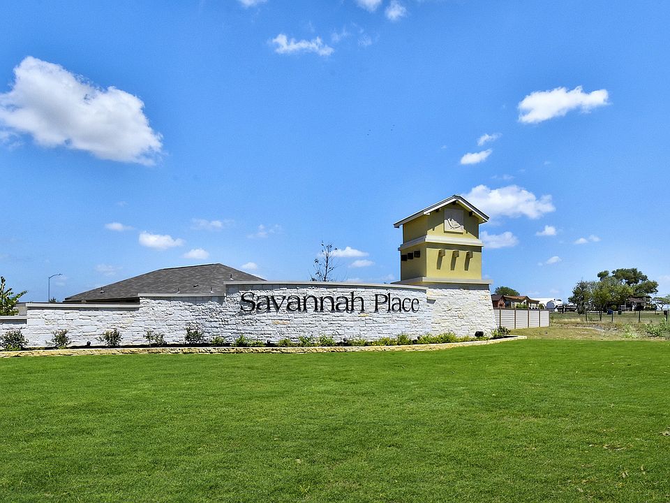 The gorgeous entry monument that greets you at Savannah Place.