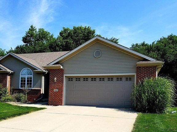 Over sized garage w/shelving and storage.