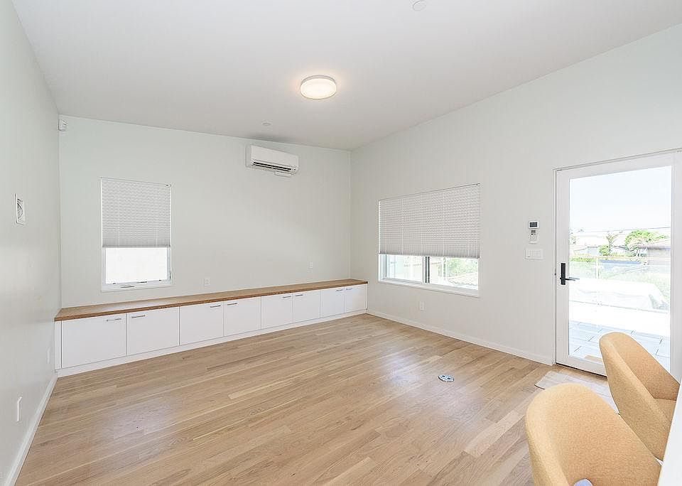 Living area with built in storage bench