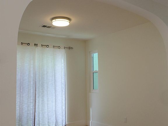 Dining room leading to private side yard