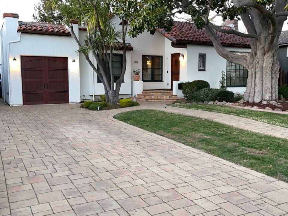 Front house (one car garage with ample shelving for storage) view left