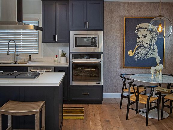 Kitchen and breakfast nook.
Art and accessories might be different than shown in pictures