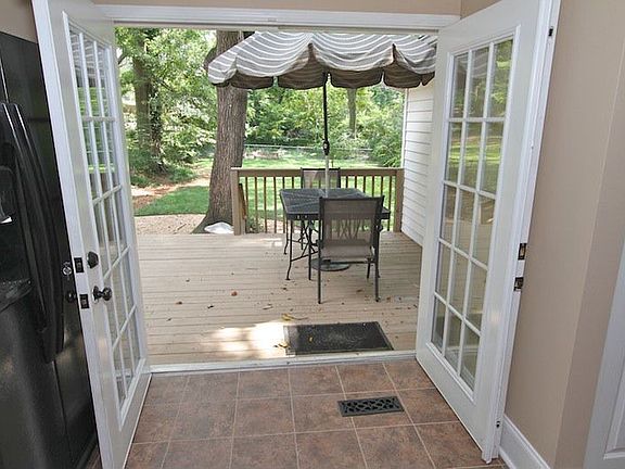 French doors to Fenced in Yard
