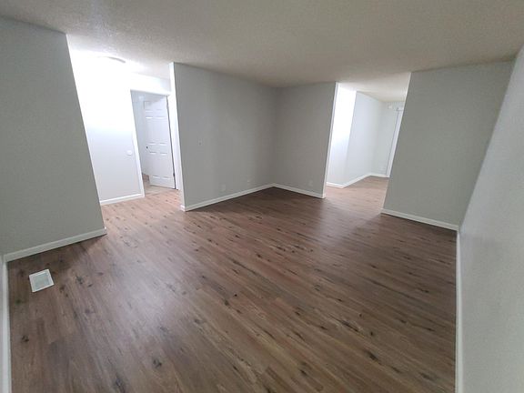 Living room opens to dining room and entry way