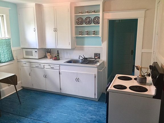 Fully stocked kitchen with brand new washer and dryer
