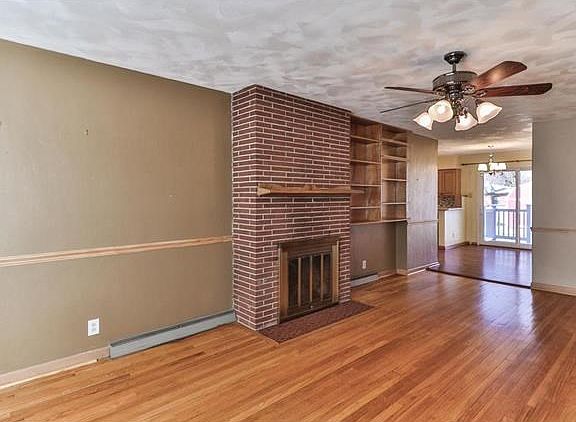 Living room opens to the dining room/kitchen areas for wonderful flow